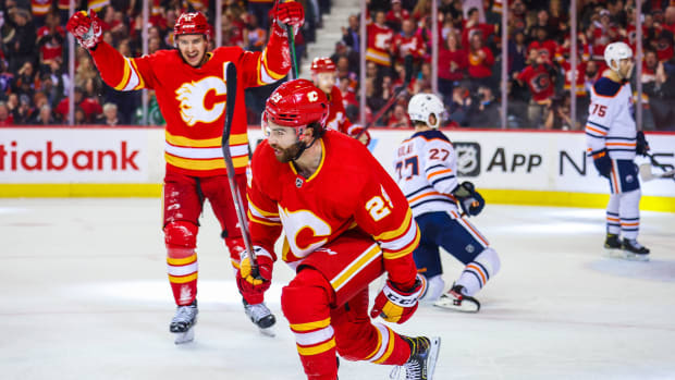 Mar 26, 2022; Calgary, Alberta, CAN; Calgary Flames center Dillon Dube (29) celebrates his goal against the Edmonton Oilers during the third period at Scotiabank Saddledome.